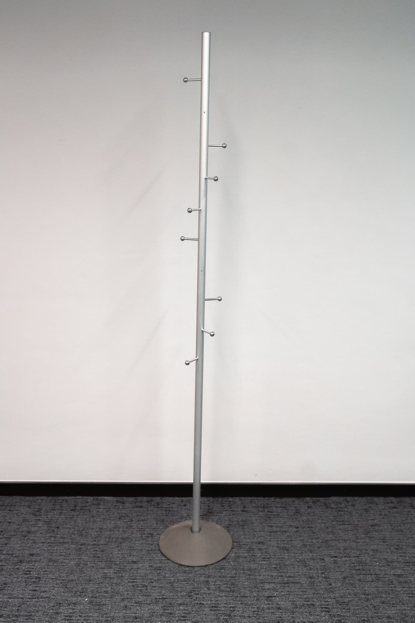 Grey metal coat rack with aluminum balls