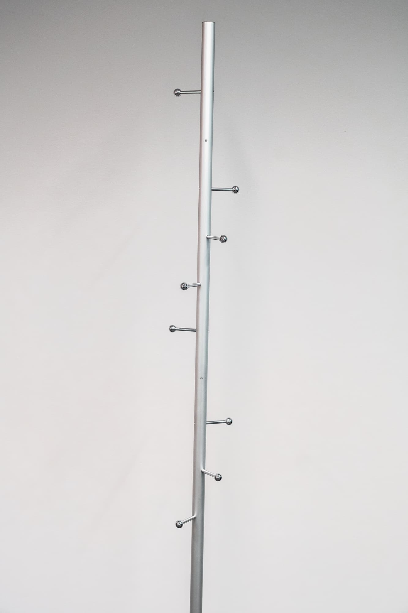 Grey metal coat rack with aluminum balls