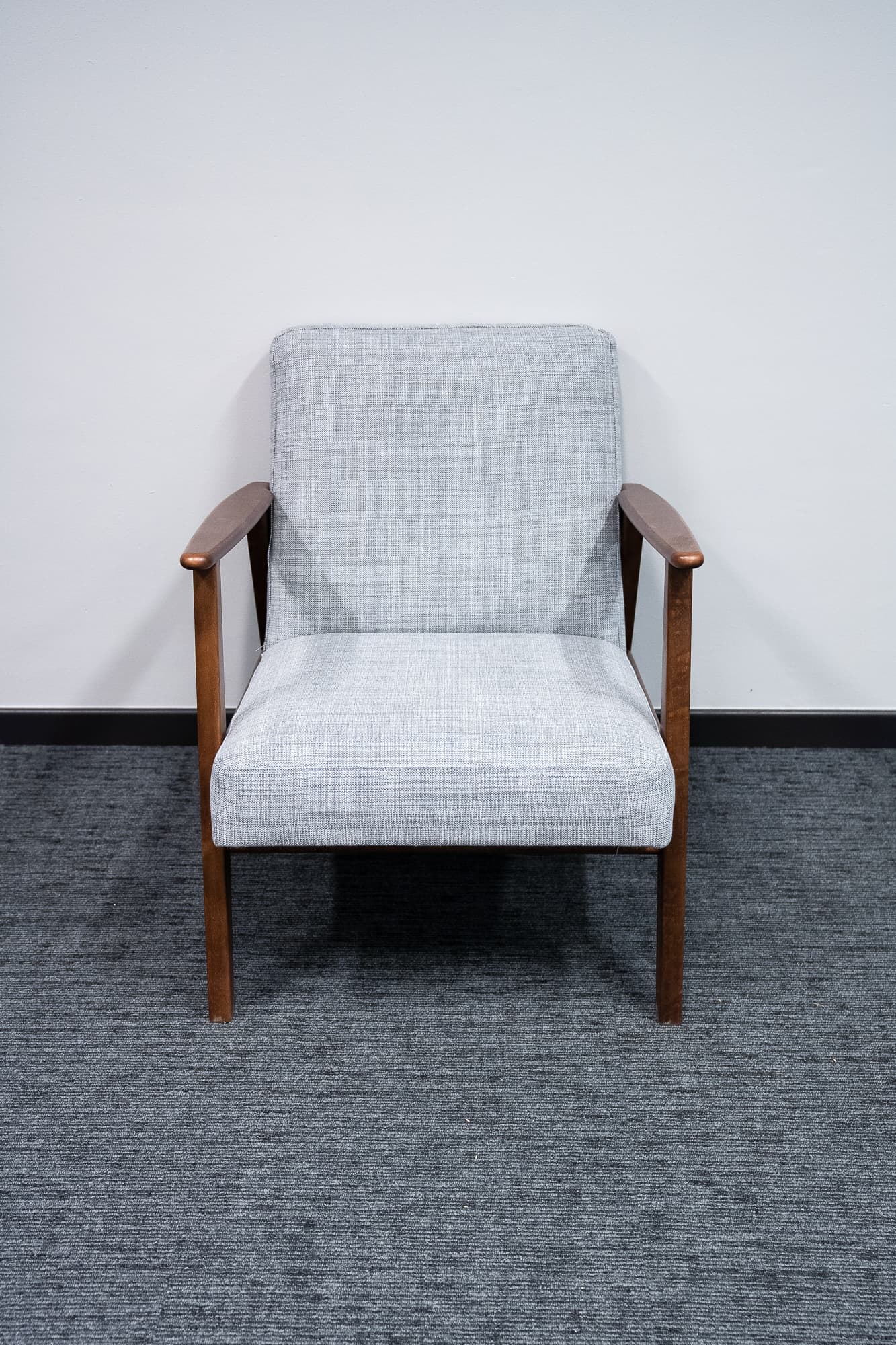 Grey and wood armchair