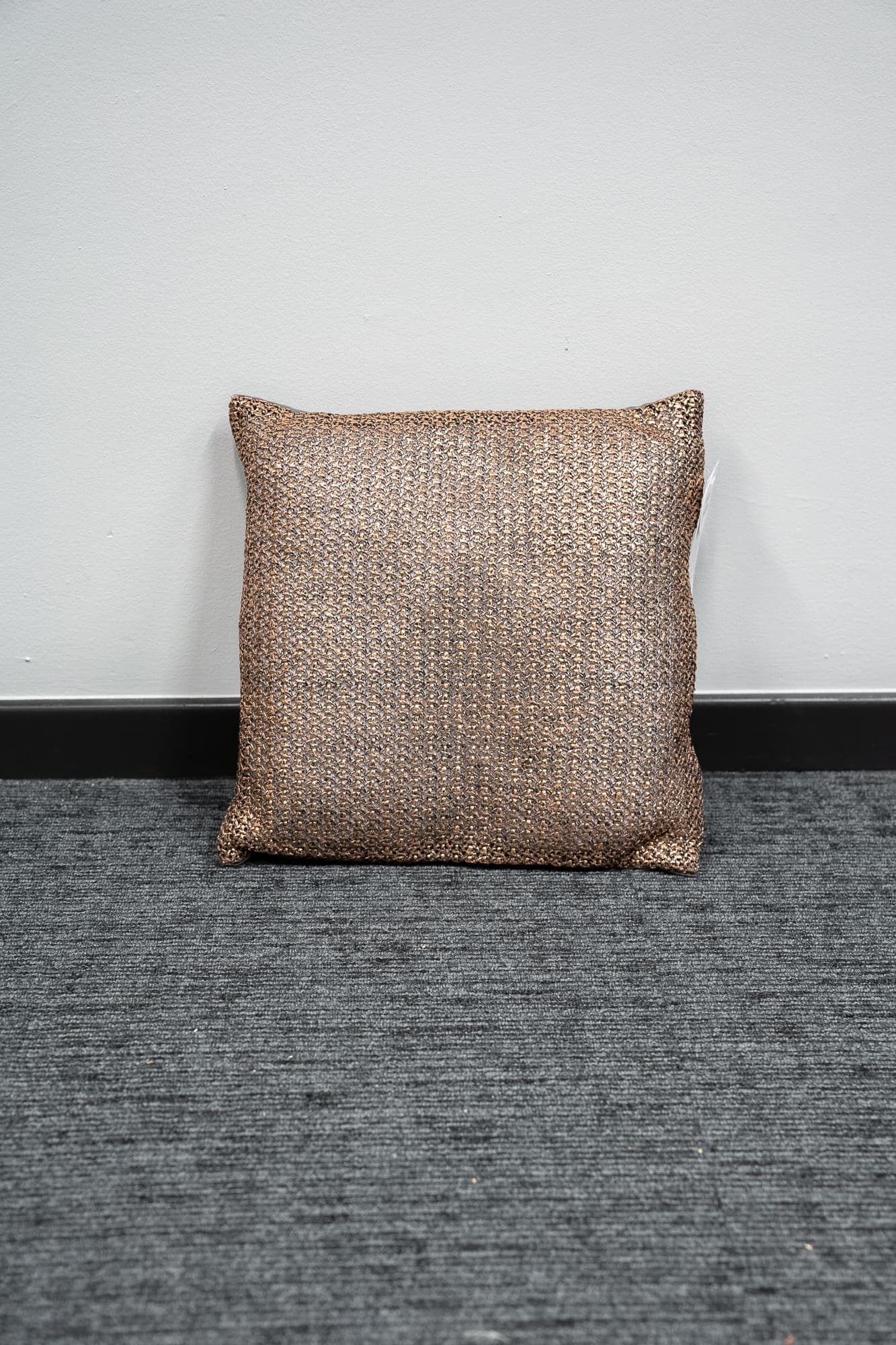 cushion with gold chain motif